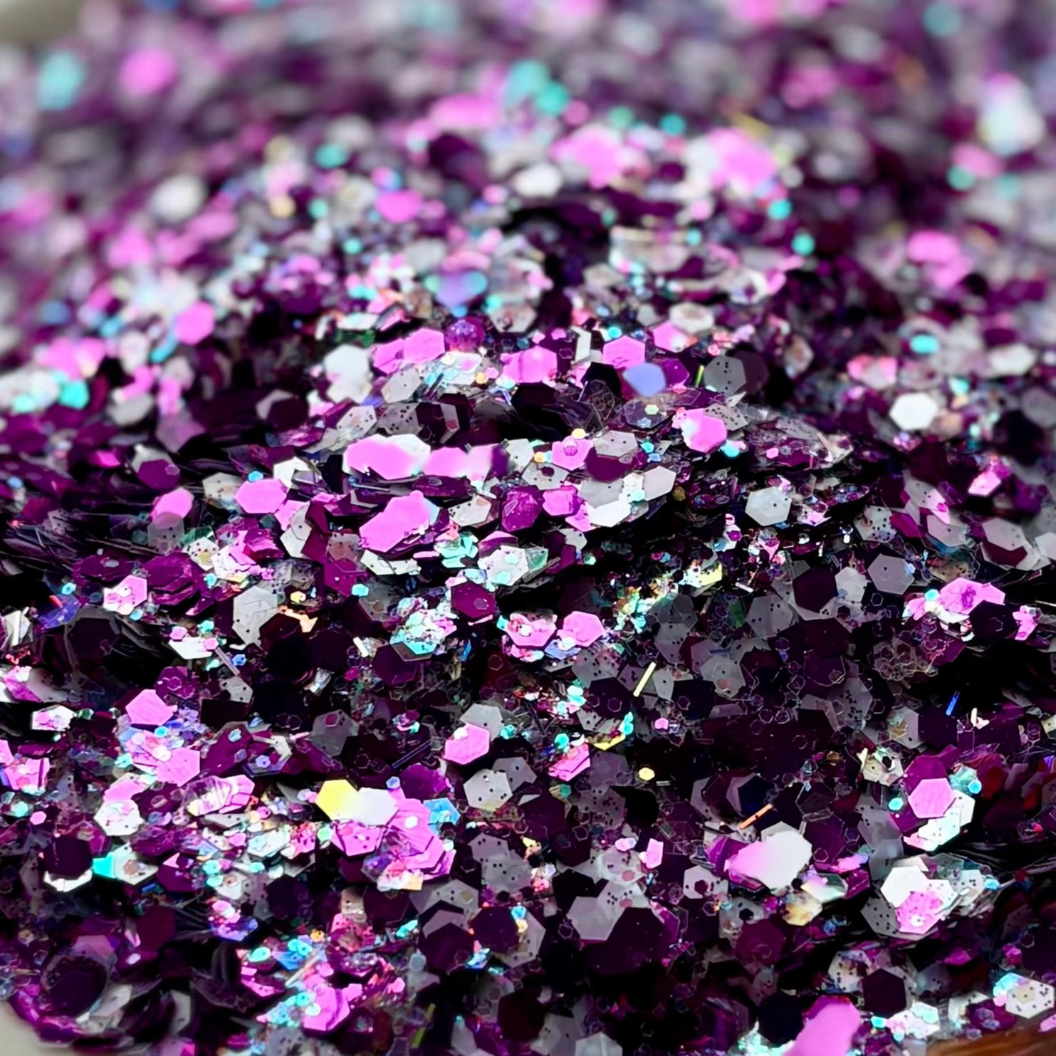 Mixture of pink, silver, purple glitter.