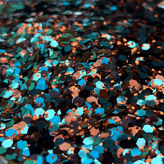 Turquoise, Brown, and copper mixed glitter in a cowhide print bowl.